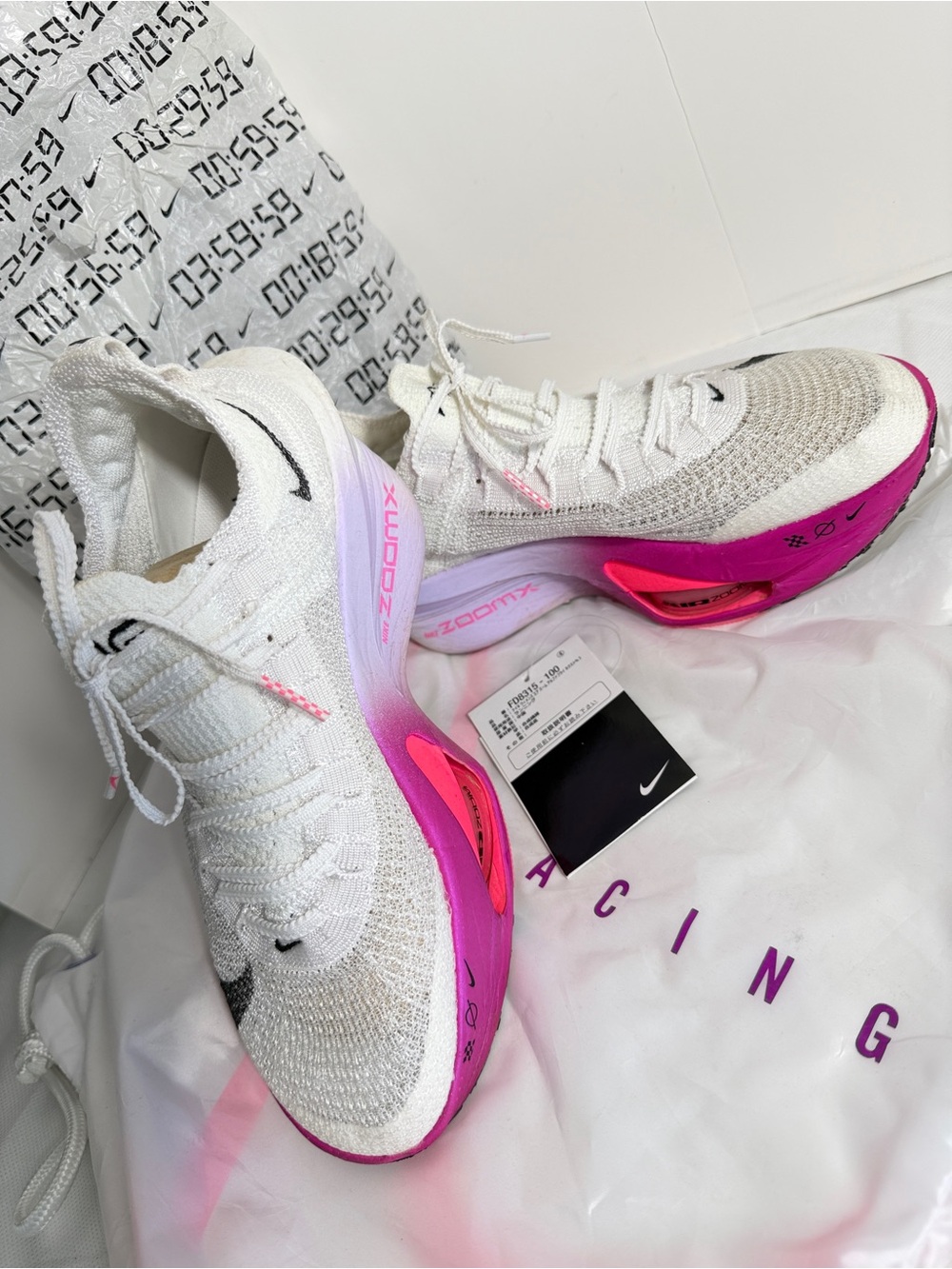 Nike Women’s White & Pink Running Shoes with ZoomX Cushioning
